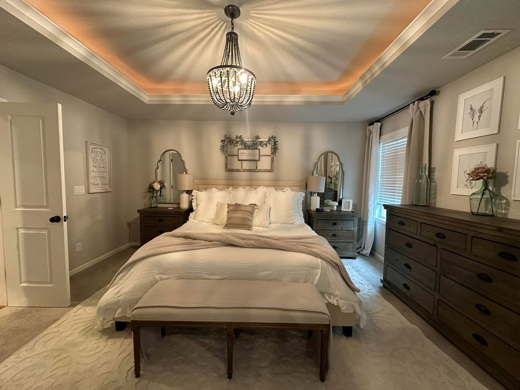 Made bed and bedroom reset by Tidy KC