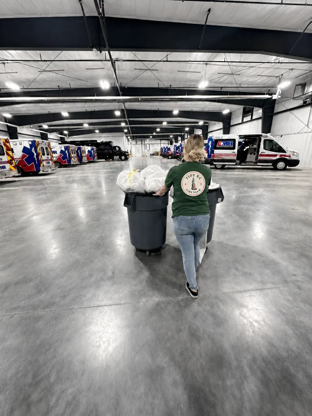 Tidy KC team member working in a large commercial cleaning space