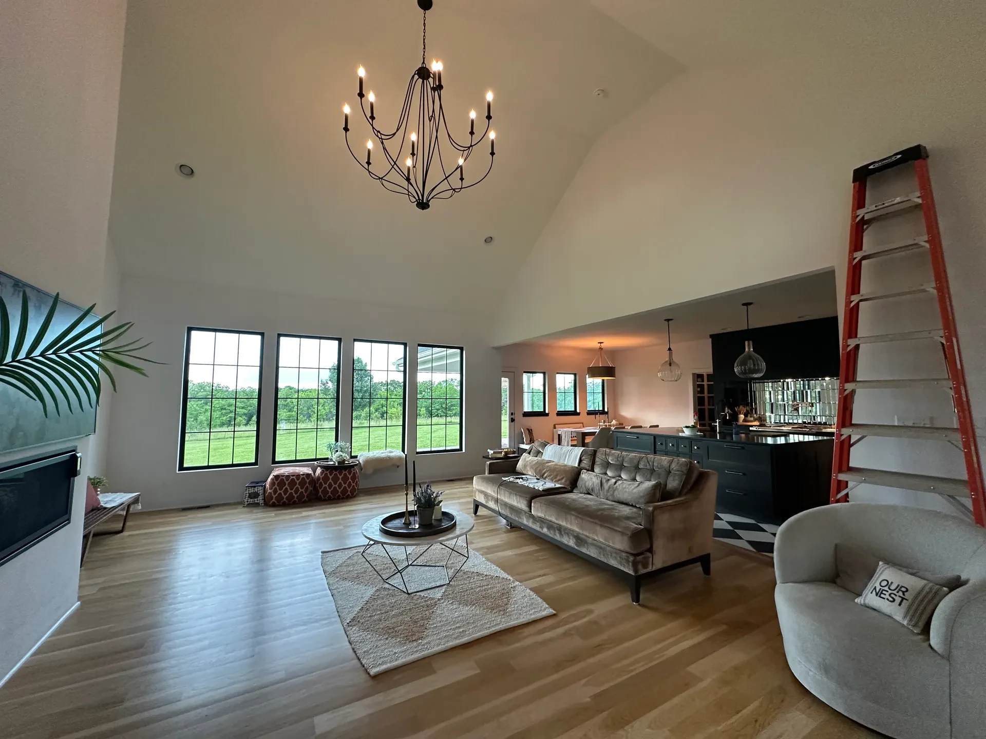 Living room with sofas and large windows